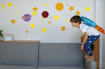Kid playing on a Sofa