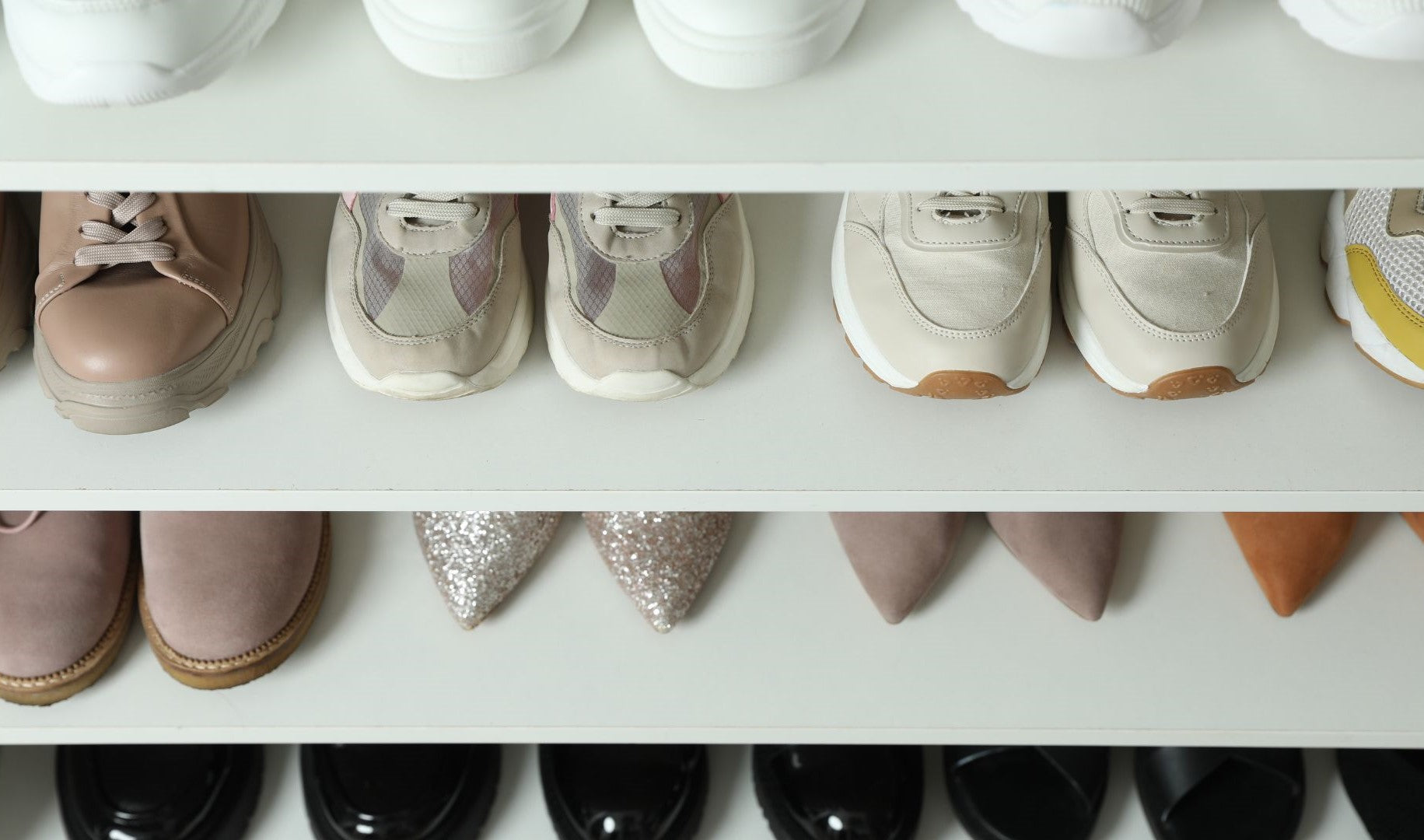 Minimalist shelving with neatly arranged shoes.